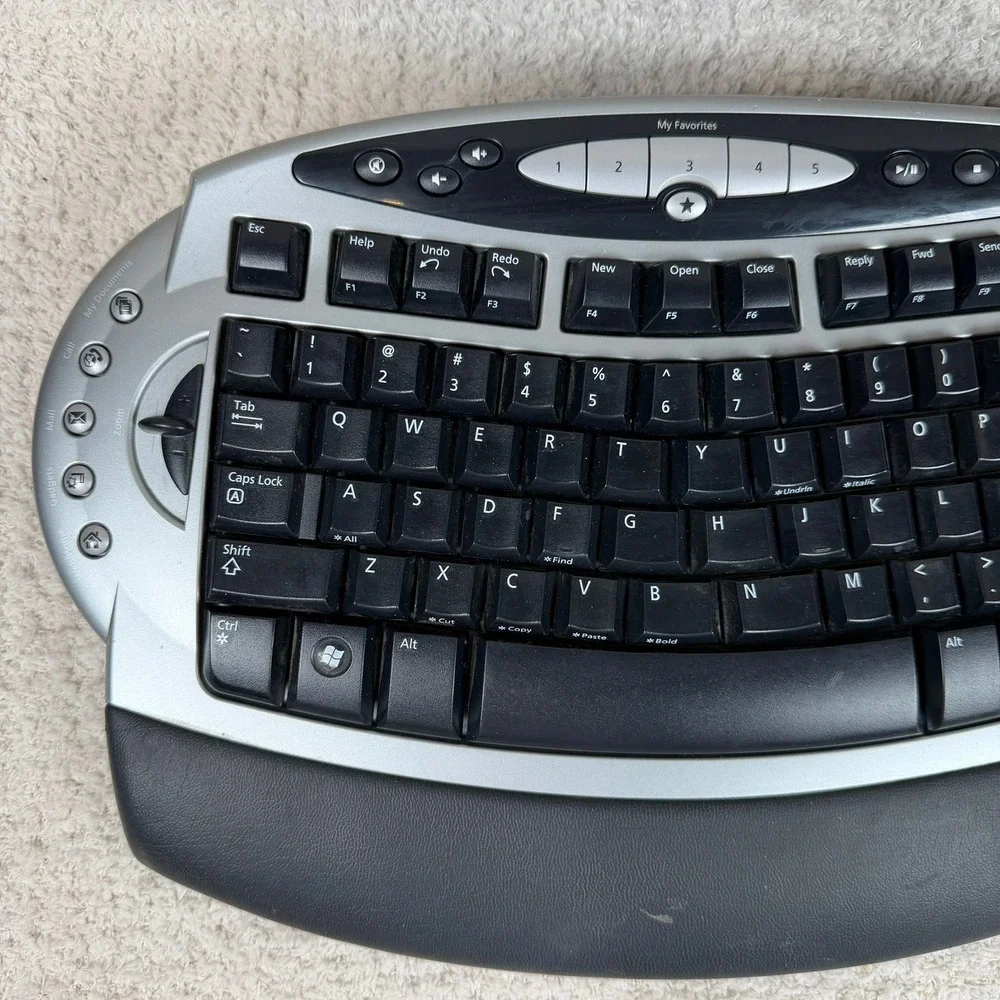 Microsoft Wireless Comfort Keyboard 4000 Ergonomic USB Model 1045 Silver Black‎